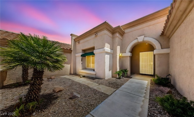 1900 Bellview St, Las Vegas, NV 89134 - view of exterior entry featuring stucco siding