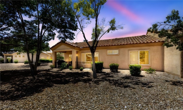 1900 Bellview St, Las Vegas, NV 89134 - view of front of house with a tiled roof and stucco siding
