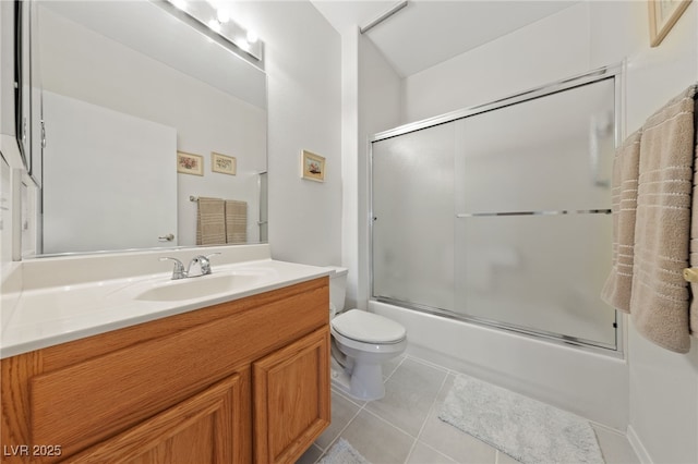 1900 Bellview St, Las Vegas, NV 89134 - bathroom featuring vanity, bath / shower combo with glass door, and tile patterned flooring
