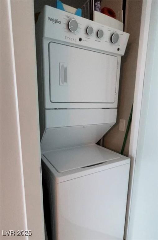 4525 Dean Martin Dr Unit 2203, Las Vegas, NV 89103 - laundry area featuring stacked washer / drying machine