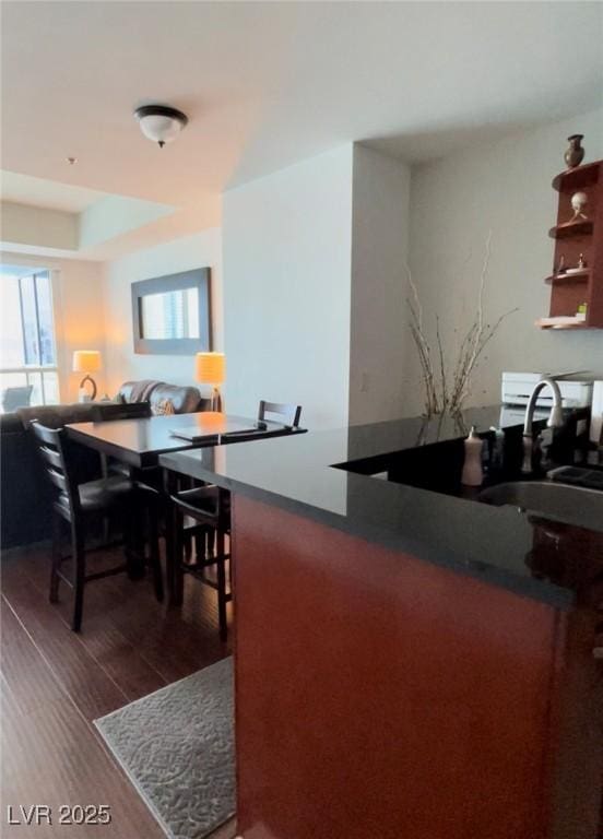 4525 Dean Martin Dr Unit 2203, Las Vegas, NV 89103 - dining area featuring dark wood-style floors