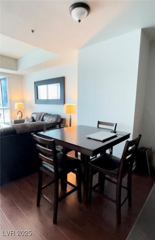 4525 Dean Martin Dr Unit 2203, Las Vegas, NV 89103 - dining room with dark wood finished floors and healthy amount of natural light