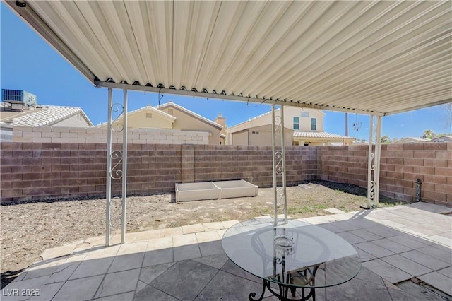 6009 Flowering Plum Ave, Las Vegas, NV 89142 - fenced backyard featuring a patio