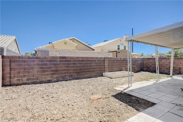 6009 Flowering Plum Ave, Las Vegas, NV 89142 - fenced backyard featuring a patio