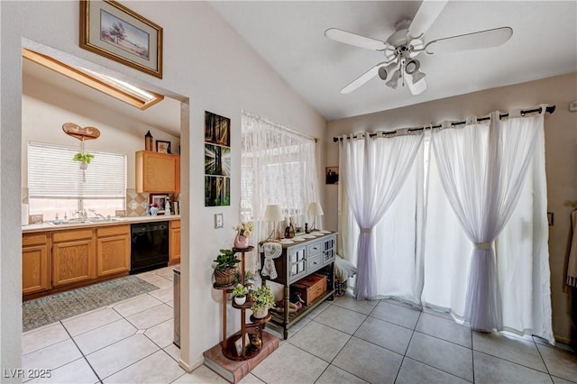 6009 Flowering Plum Ave, Las Vegas, NV 89142 - interior space featuring vaulted ceiling, light tile patterned floors, and ceiling fan