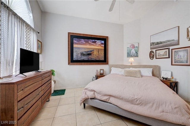 6009 Flowering Plum Ave, Las Vegas, NV 89142 - bedroom featuring light tile patterned flooring and baseboards