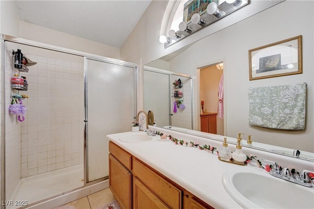 6009 Flowering Plum Ave, Las Vegas, NV 89142 - full bathroom with a shower stall, double vanity, and tile patterned floors