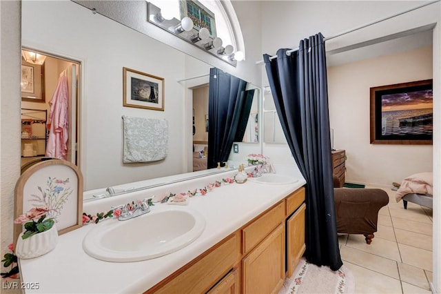 6009 Flowering Plum Ave, Las Vegas, NV 89142 - bathroom with double vanity and tile patterned flooring
