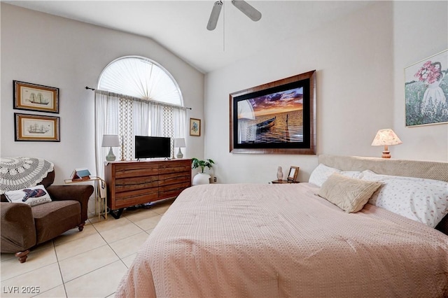 6009 Flowering Plum Ave, Las Vegas, NV 89142 - bedroom with light tile patterned floors, lofted ceiling, and a ceiling fan