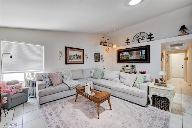 6009 Flowering Plum Ave, Las Vegas, NV 89142 - living area with vaulted ceiling and light tile patterned floors