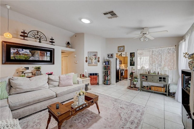 6009 Flowering Plum Ave, Las Vegas, NV 89142 - living area featuring lofted ceiling, a ceiling fan, and light tile patterned floors