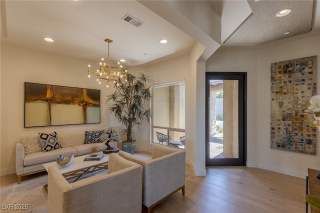 975 Amara Way, Henderson, NV 89052 - living room featuring wood finished floors, a chandelier, and recessed lighting