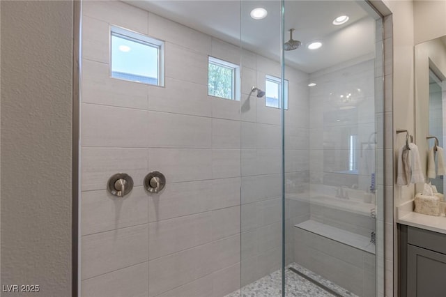 975 Amara Way, Henderson, NV 89052 - bathroom with a tile shower, vanity, and recessed lighting