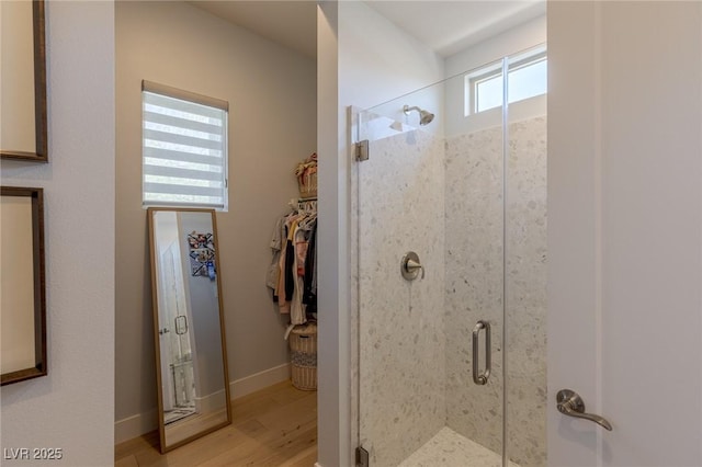 975 Amara Way, Henderson, NV 89052 - full bath with a stall shower, wood finished floors, and a walk in closet