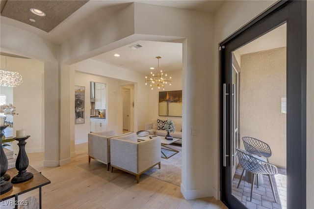 975 Amara Way, Henderson, NV 89052 - living room featuring a chandelier, light wood-style flooring, and recessed lighting