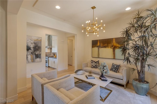 975 Amara Way, Henderson, NV 89052 - living room featuring a chandelier, light wood finished floors, and recessed lighting