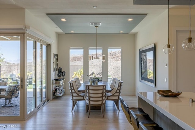 975 Amara Way, Henderson, NV 89052 - dining room featuring a chandelier, light wood-style flooring, and recessed lighting