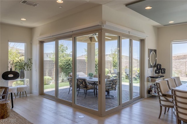 975 Amara Way, Henderson, NV 89052 - doorway to outside featuring healthy amount of natural light, wood-type flooring, recessed lighting, and ceiling fan