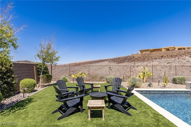 975 Amara Way, Henderson, NV 89052 - fenced backyard featuring a fire pit
