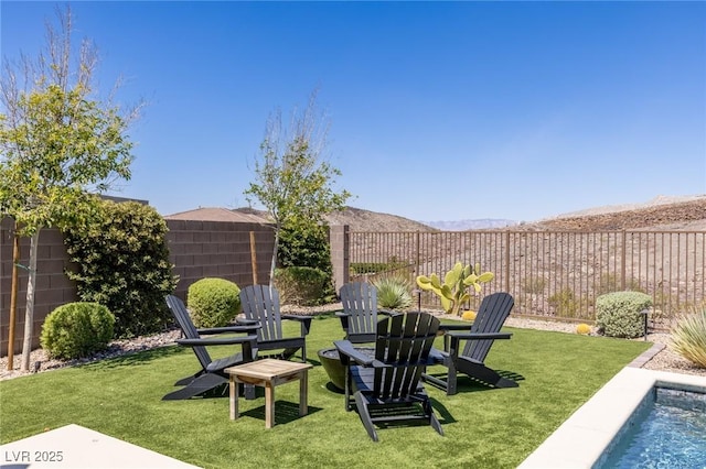 975 Amara Way, Henderson, NV 89052 - fenced backyard featuring a fire pit