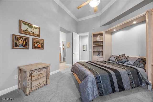 108 Valiente St, Las Vegas, NV 89144 - bedroom featuring light colored carpet, crown molding, a towering ceiling, a ceiling fan, and connected bathroom
