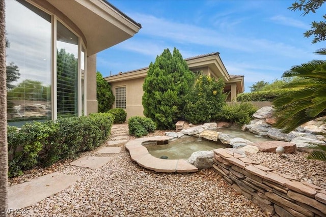108 Valiente St, Las Vegas, NV 89144 - view of yard featuring a small pond
