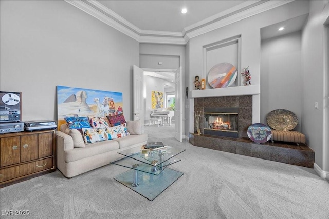 108 Valiente St, Las Vegas, NV 89144 - carpeted living room with ornamental molding, a premium fireplace, and recessed lighting