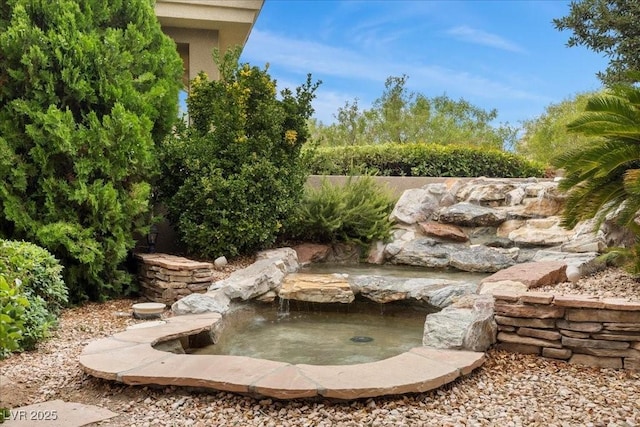 108 Valiente St, Las Vegas, NV 89144 - view of yard featuring a garden pond