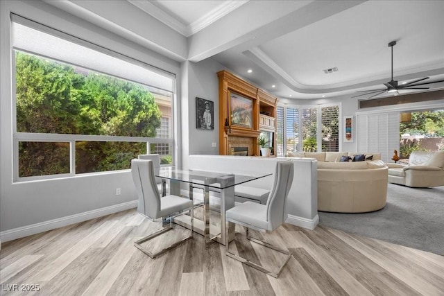 108 Valiente St, Las Vegas, NV 89144 - dining room with crown molding, a fireplace, wood finished floors, ceiling fan, and recessed lighting