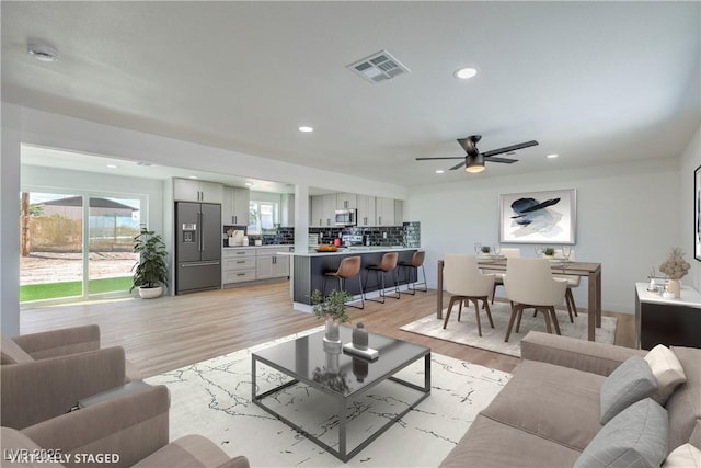 5200 Blanton Dr, Las Vegas, NV 89122 - living area with recessed lighting, light wood-style flooring, and a ceiling fan