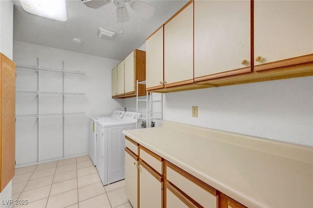 454 Intrepid Ct, Boulder City, NV 89005 - washroom featuring cabinet space, washer and clothes dryer, ceiling fan, and light tile patterned flooring