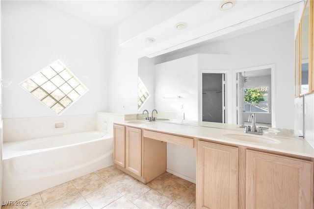 8537 Highland View Ave, Las Vegas, NV 89145 - bathroom with double vanity, a bath, and tile patterned floors
