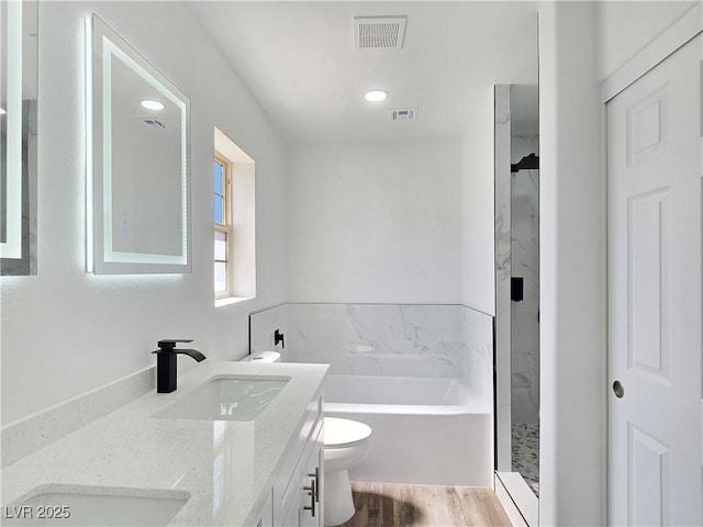 3326 Mount Charleston Dr, Pahrump, NV 89048 - bathroom featuring double vanity, a garden tub, and a shower stall