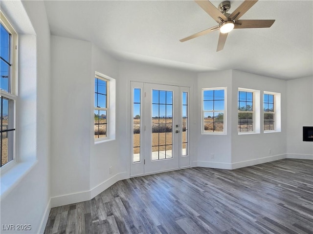 3326 Mount Charleston Dr, Pahrump, NV 89048 - unfurnished room featuring wood finished floors, plenty of natural light, and a ceiling fan