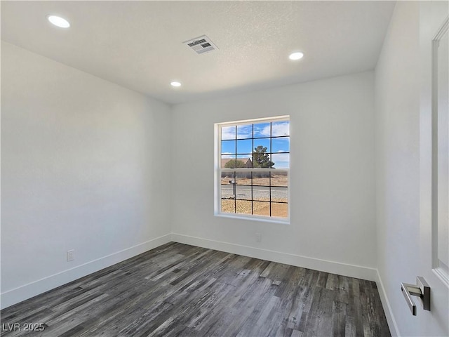 3326 Mount Charleston Dr, Pahrump, NV 89048 - spare room featuring dark wood finished floors and recessed lighting