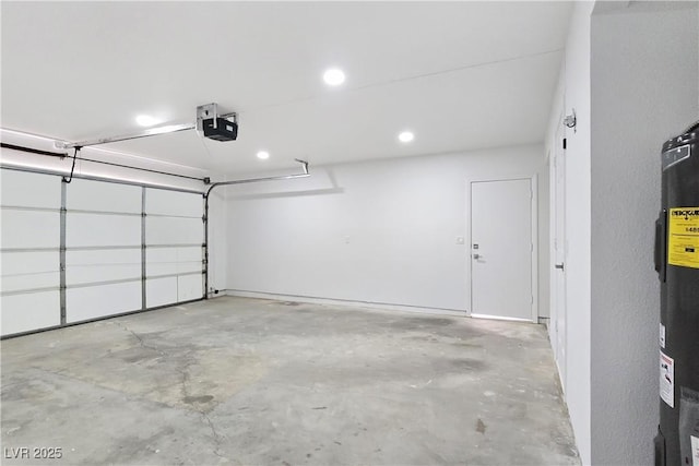 3326 Mount Charleston Dr, Pahrump, NV 89048 - garage with a garage door opener, water heater, and recessed lighting