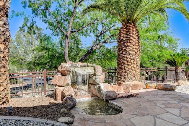 536 Pima Canyon Ct, Las Vegas, NV 89144 - view of patio with a garden pond
