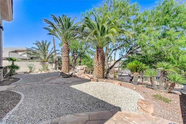 536 Pima Canyon Ct, Las Vegas, NV 89144 - fenced backyard featuring a patio area