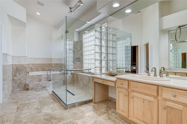536 Pima Canyon Ct, Las Vegas, NV 89144 - full bathroom with vanity, a garden tub, tiled shower, tile patterned floors, and recessed lighting