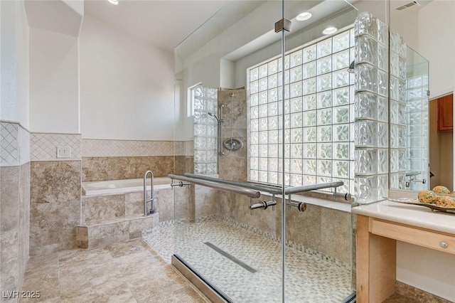 536 Pima Canyon Ct, Las Vegas, NV 89144 - full bath with a bath, a stall shower, and vanity
