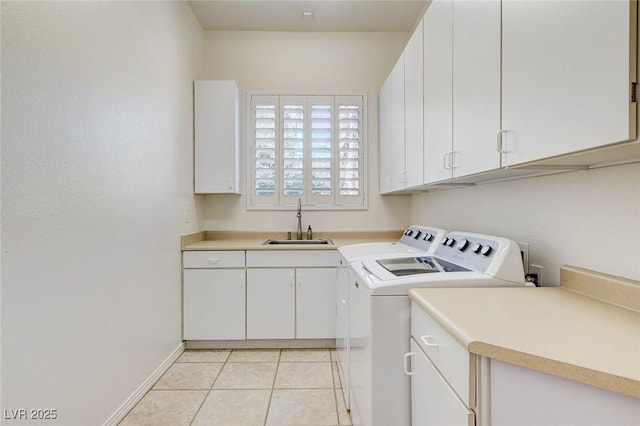 536 Pima Canyon Ct, Las Vegas, NV 89144 - laundry area with washing machine and dryer, cabinet space, and light tile patterned flooring