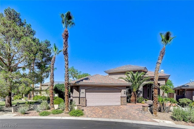 536 Pima Canyon Ct, Las Vegas, NV 89144 - view of front facade with stucco siding, a garage, and driveway