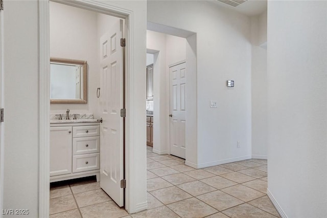 536 Pima Canyon Ct, Las Vegas, NV 89144 - hallway with light tile patterned floors and baseboards
