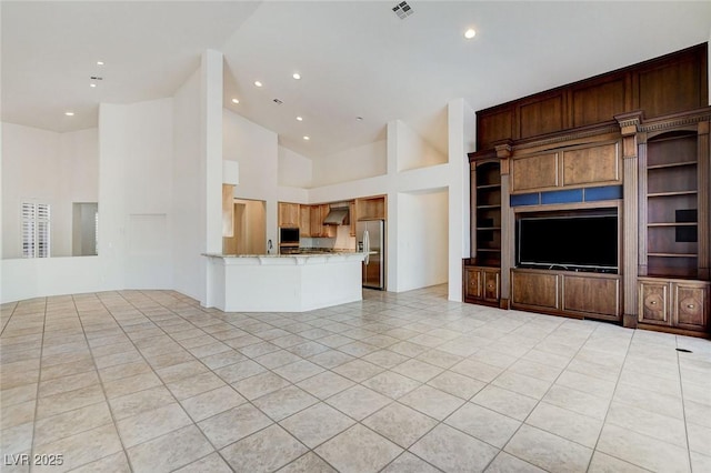 536 Pima Canyon Ct, Las Vegas, NV 89144 - unfurnished living room with lofted ceiling, recessed lighting, and light tile patterned floors