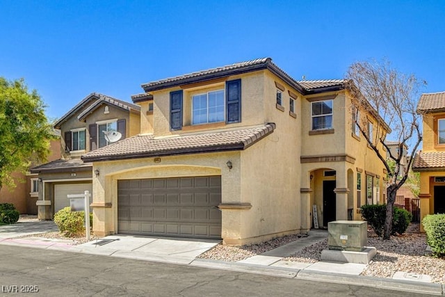 4440 Acropolis Ave, North Las Vegas, NV 89031 - view of front of house with a garage, a tiled roof, stucco siding, and concrete driveway