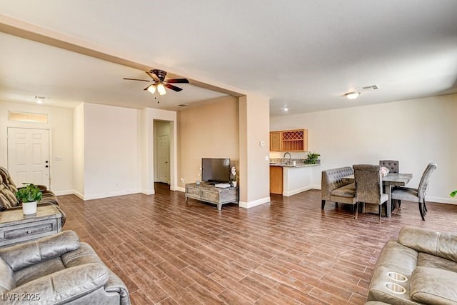 4440 Acropolis Ave, North Las Vegas, NV 89031 - living area with ceiling fan and wood finished floors