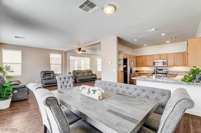 4440 Acropolis Ave, North Las Vegas, NV 89031 - dining space with wood finished floors, a ceiling fan, and recessed lighting