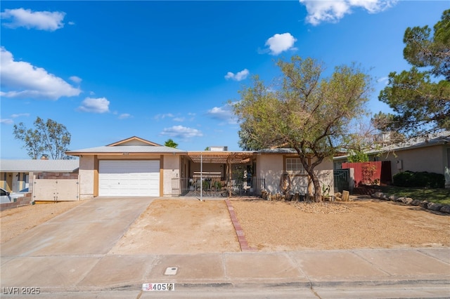 405 Box Elder Way, Henderson, NV 89015 - ranch-style home featuring an attached garage, stucco siding, and driveway