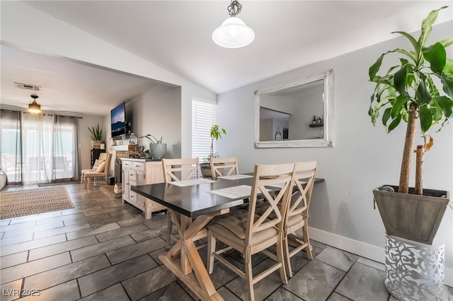 405 Box Elder Way, Henderson, NV 89015 - dining room featuring lofted ceiling and baseboards