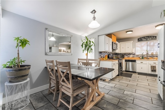 405 Box Elder Way, Henderson, NV 89015 - dining room with lofted ceiling and baseboards